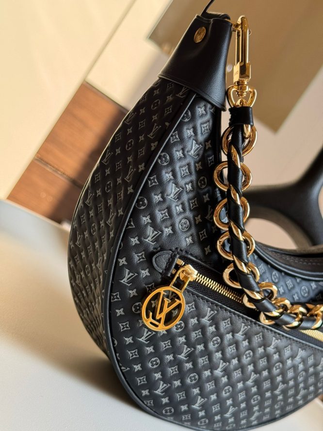 LOUIS VUITTON- LOOP HAND BAG