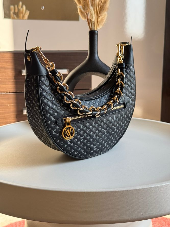 LOUIS VUITTON- LOOP HAND BAG