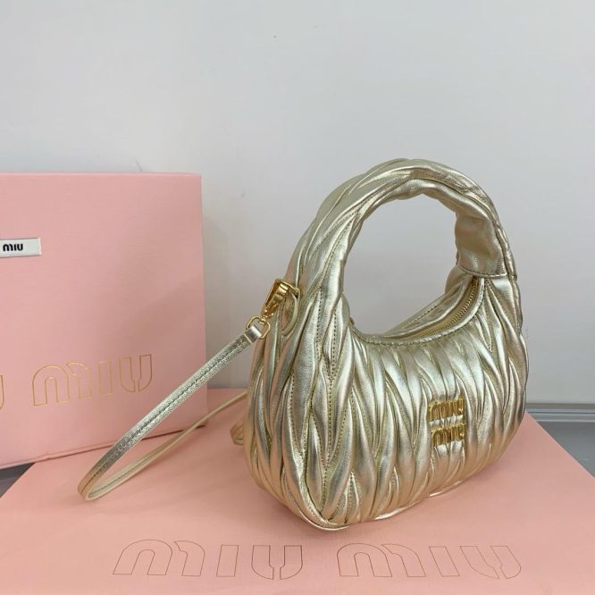 Miu Miu Gold Suede Handbag - Women