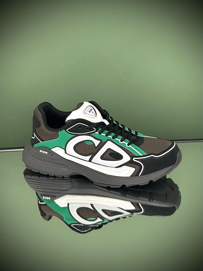 Dior B30 sneakers in black, green, and white with mesh and leather panels, featuring the bold .