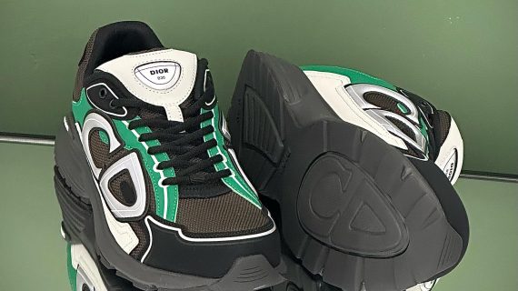 Dior B30 sneakers in black, green, and white with mesh and leather panels, featuring the bold .