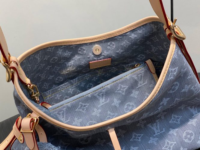 Louis Vuitton Monogram Denim Hobo Bag – a casual shoulder bag in blue denim with leather trim and signature monogram pattern.